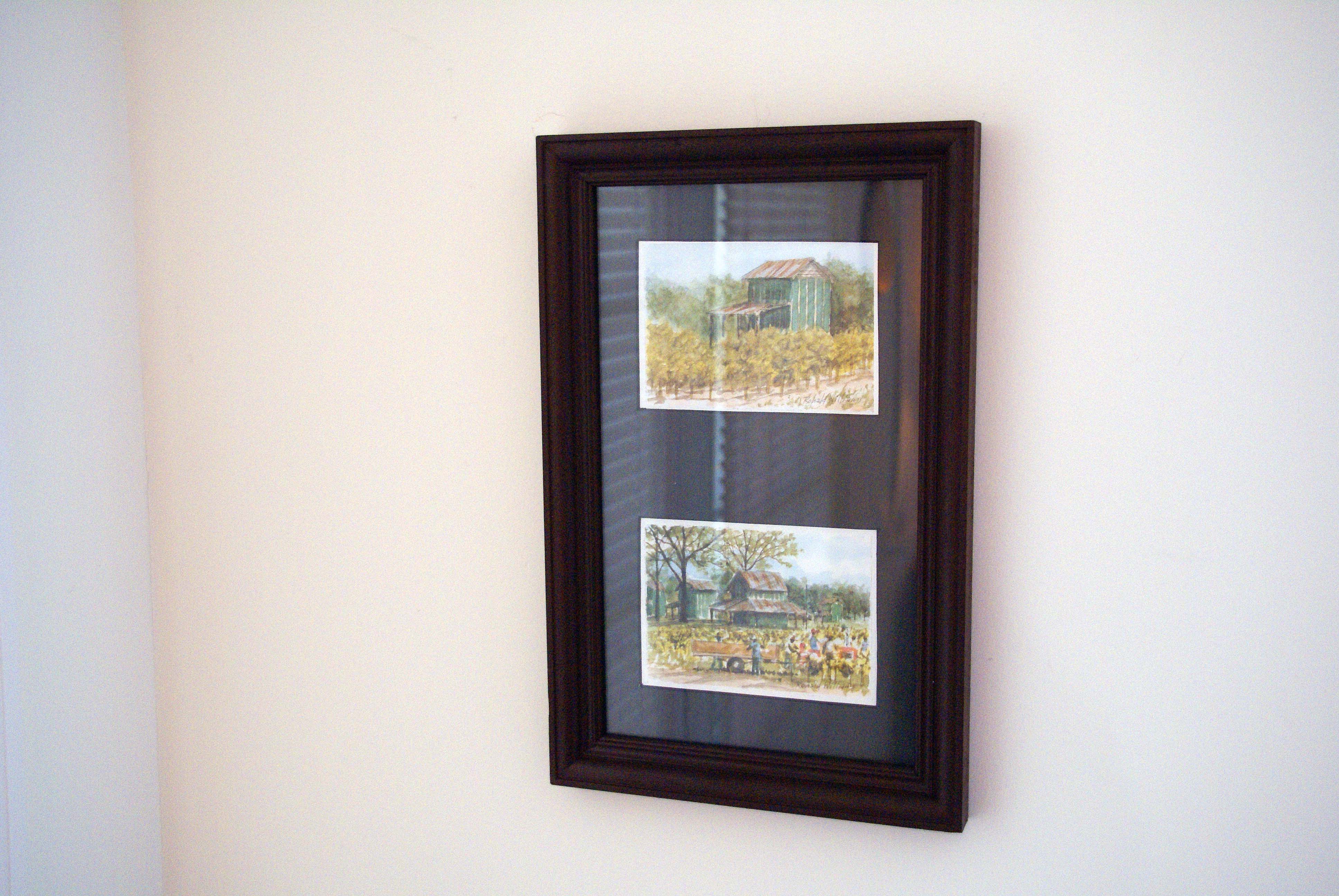 double mat and frame of tobacco art work