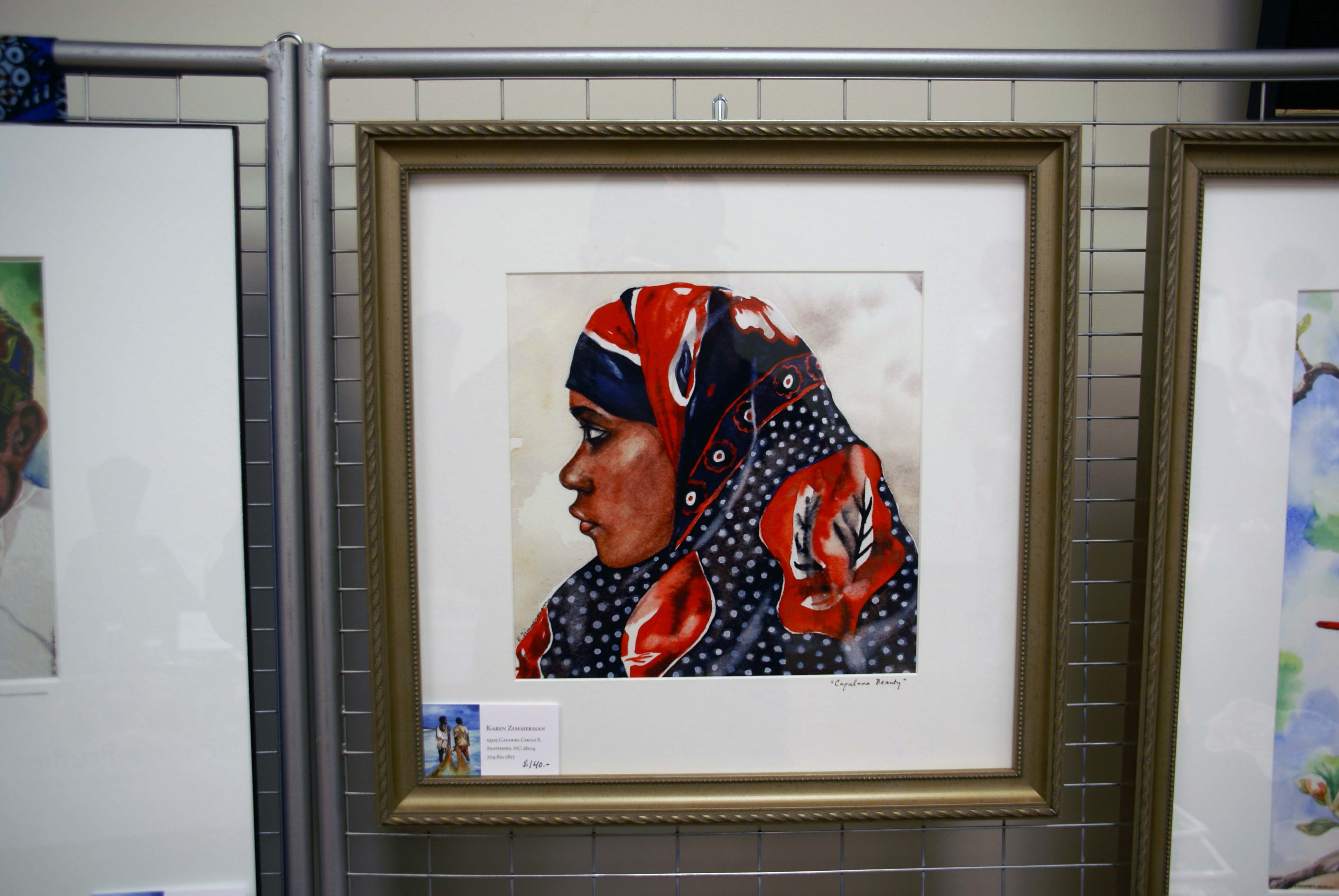 Gallery photo of African woman with gold frame